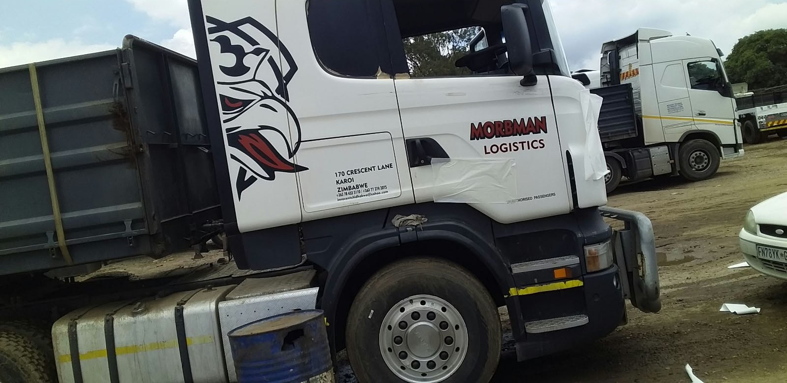 Morbman Logistics truck cab branding